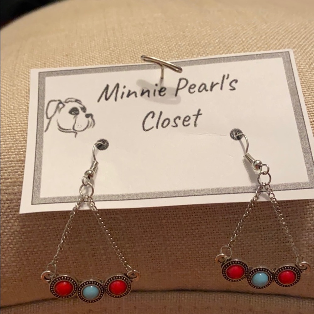 Dangling red and light blue earring